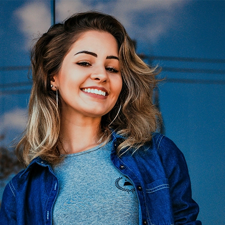 Dentist Raleigh NC Lady Smiling Outside